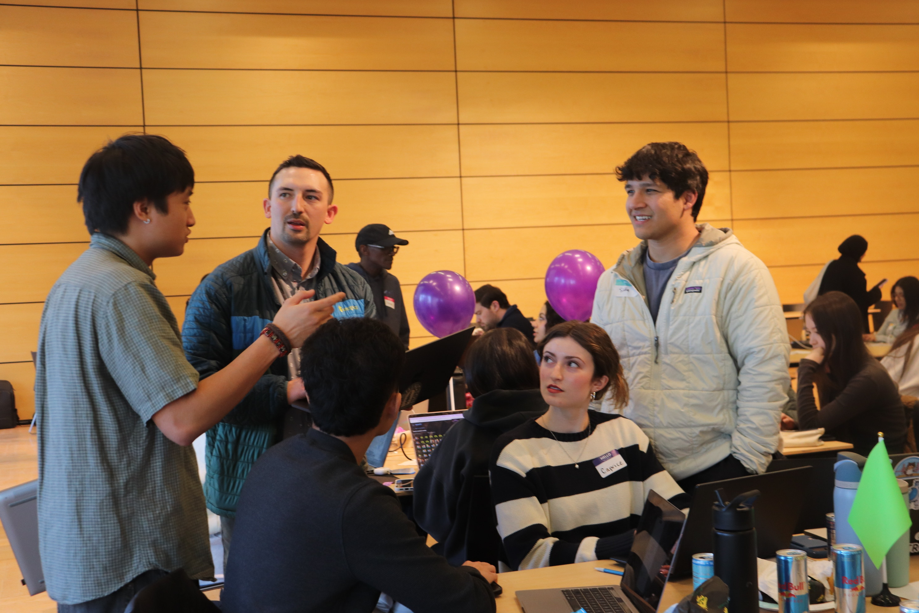 winfo team talking and explaining to mentor